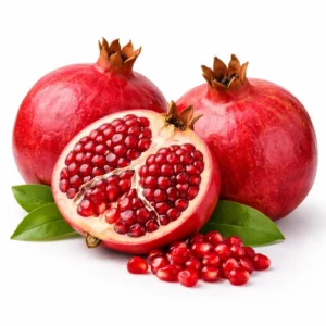 Fresh Indian pomegranate on white background | رمان هندي طازج بخلفية بيضاء